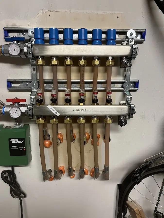 Plumber performing Water Heater Repair at a residential property in Nutley